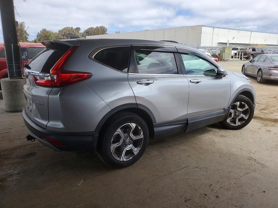 Photo 3 from auction – 2018 HONDA CR-V with VIN 7FARW2H86JE015296