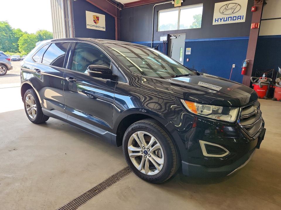 Photo 4 from auction – 2015 FORD EDGE with VIN 2FMTK4J9XFBB97936