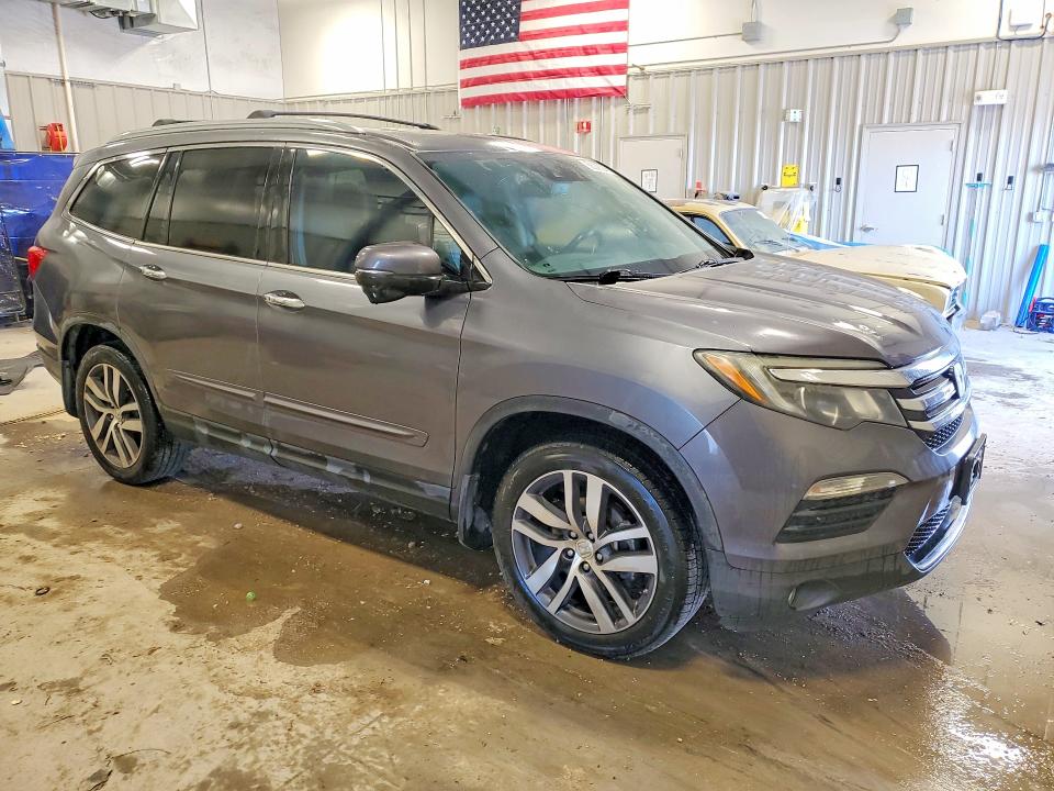 Photo 4 from auction – 2016 HONDA PILOT with VIN 5FNYF6H95GB103725