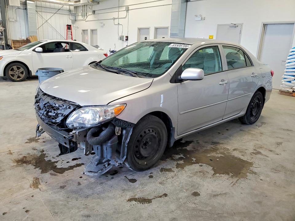 TOYOTA COROLLA 2011 with VIN 2T1BU4EEXBC673797 - Photo from auction