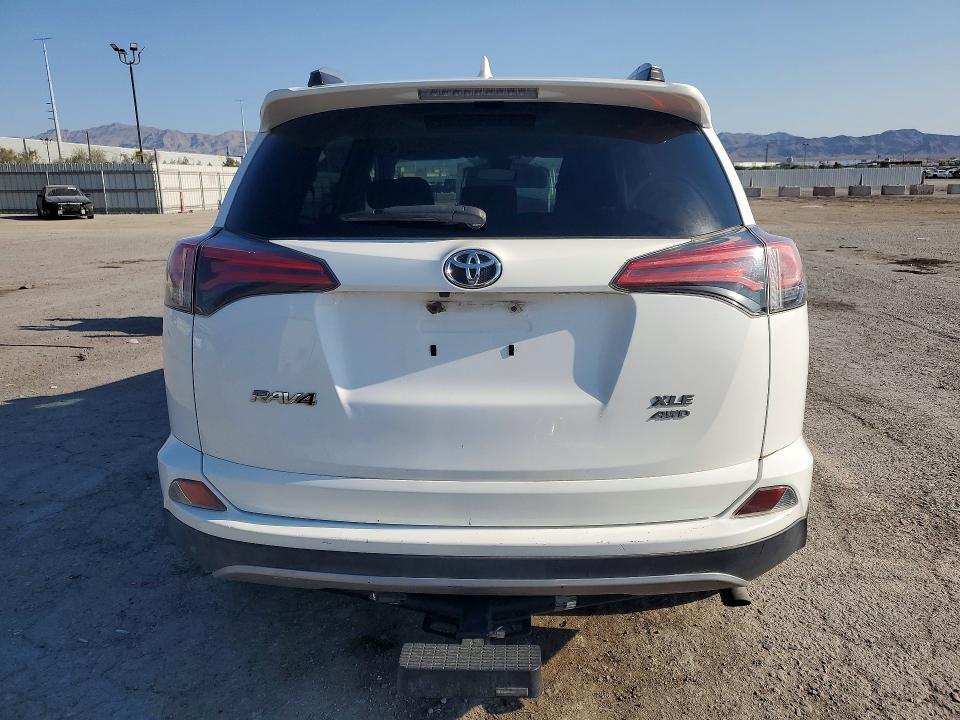 Photo 6 from auction – 2017 TOYOTA RAV4 with VIN 2T3RFREV3HW551044