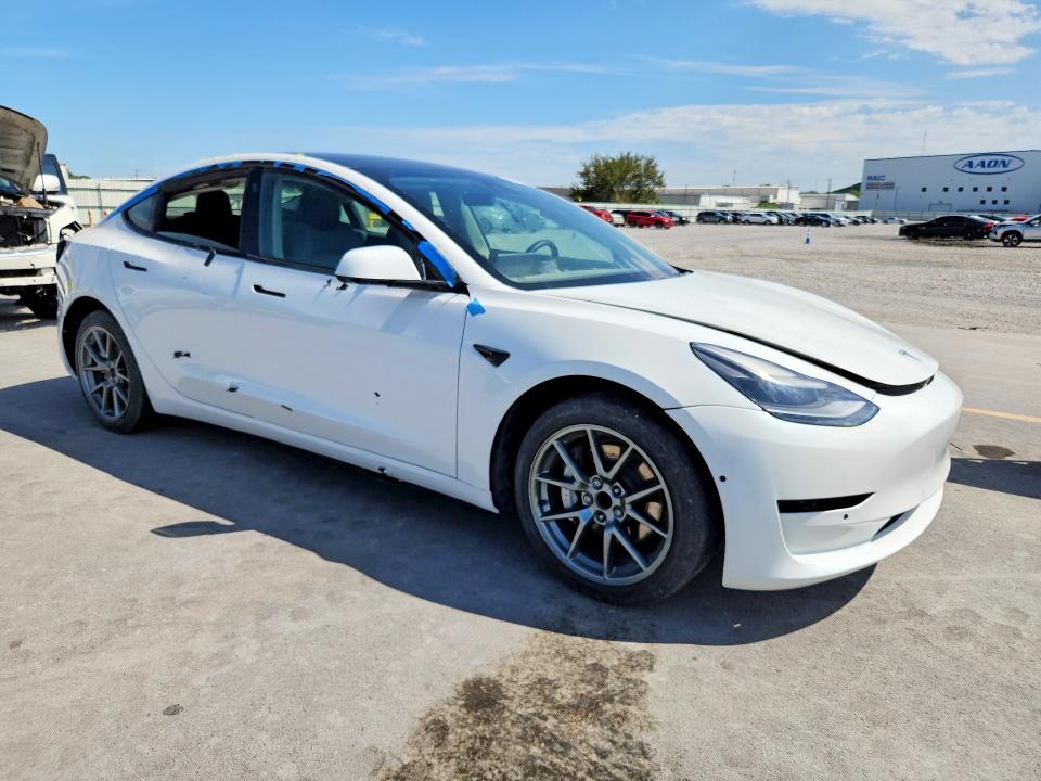 Photo 4 from auction – 2021 TESLA MODEL 3 with VIN 5YJ3E1EA0MF093194