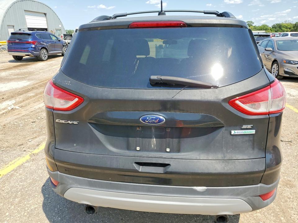 Photo 6 from auction – 2013 FORD ESCAPE with VIN 1FMCU0GX4DUA04177