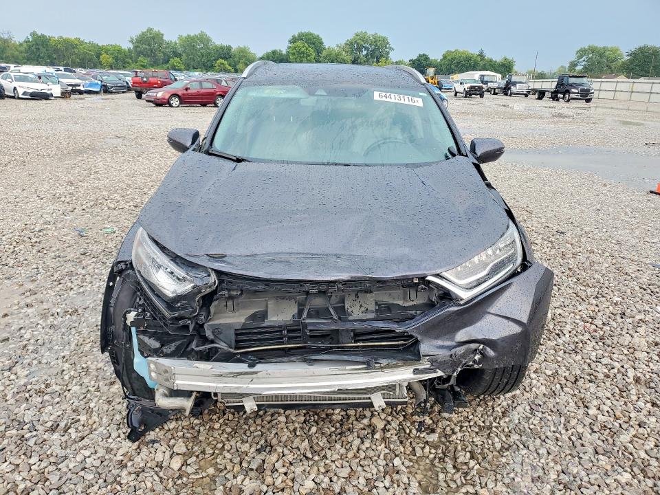 Photo 5 from auction – 2018 HONDA CR-V with VIN 7FARW2H93JE092474