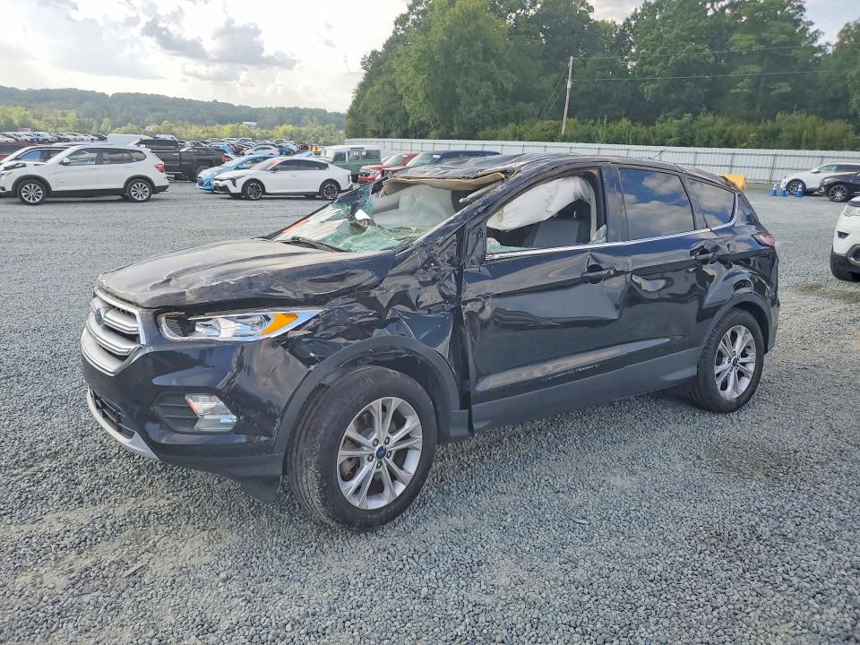 FORD ESCAPE 2017 with VIN 1FMCU9GD8HUD17040 - Photo from auction