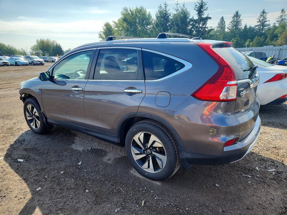 Photo 2 from auction – 2016 HONDA CR-V with VIN 5J6RM4H98GL800697