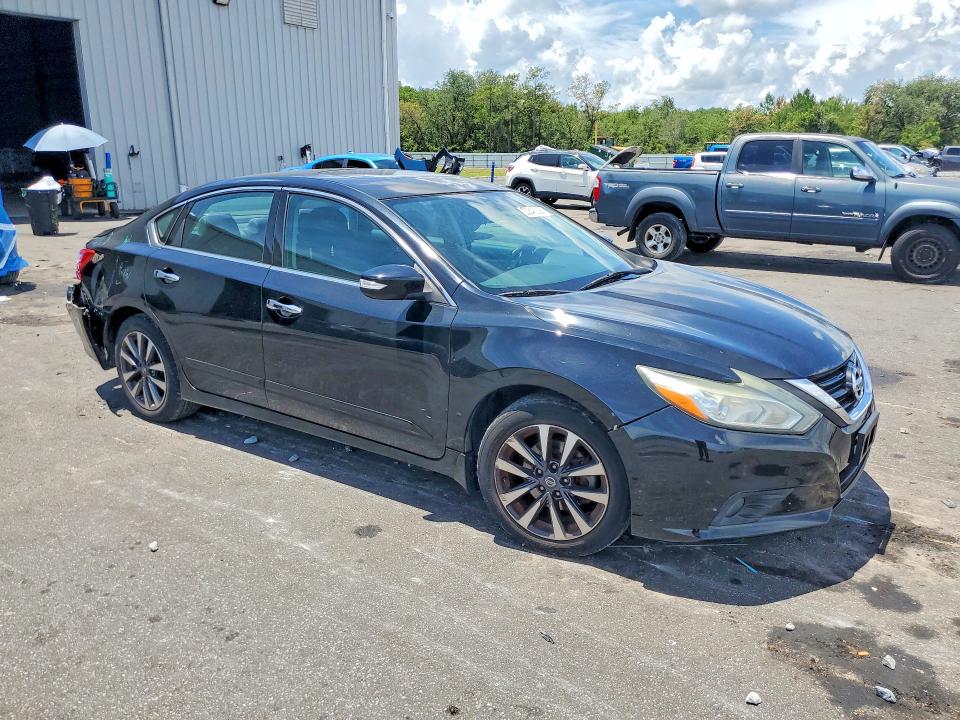 Photo 4 from auction – 2016 NISSAN ALTIMA with VIN 1N4AL3AP8GC120460