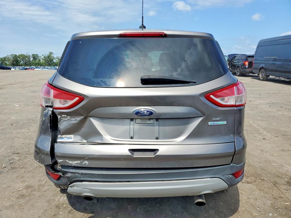 Foto 6 de la subasta – 2013 FORD ESCAPE con VIN 1FMCU0GX0DUA28461
