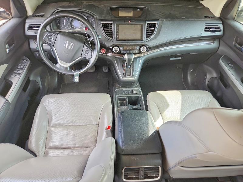 Photo 8 from auction – 2016 HONDA CR-V with VIN 2HKRM4H79GH697444