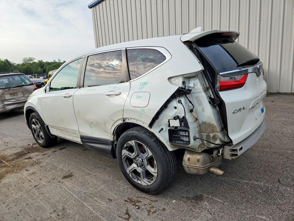 Photo 2 from auction – 2018 HONDA CR-V with VIN 2HKRW2H86JH635353