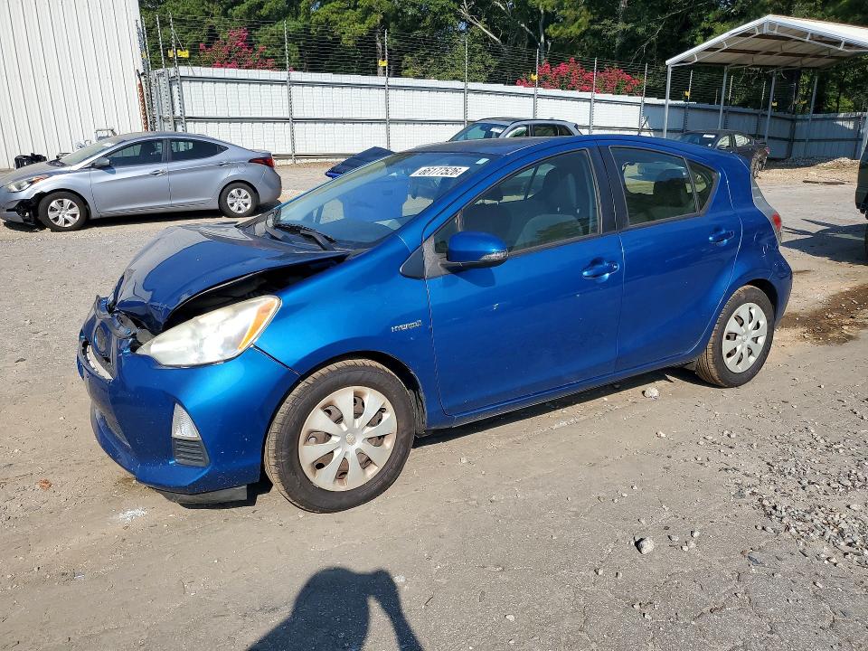 TOYOTA PRIUS C 2013 with VIN JTDKDTB30D1534086 - Photo from auction