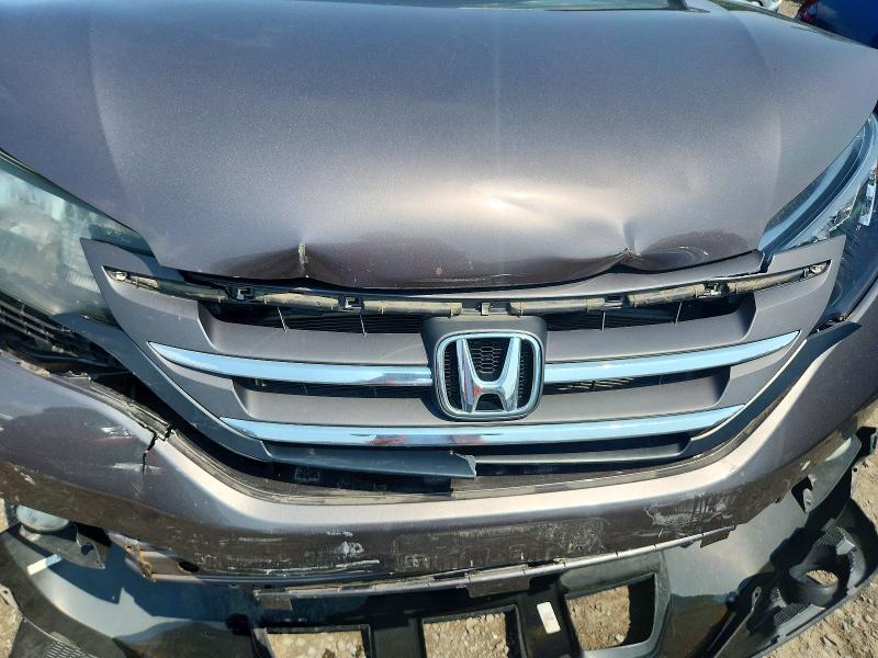 Photo 12 from auction – 2014 HONDA CR-V with VIN 2HKRM4H56EH677468