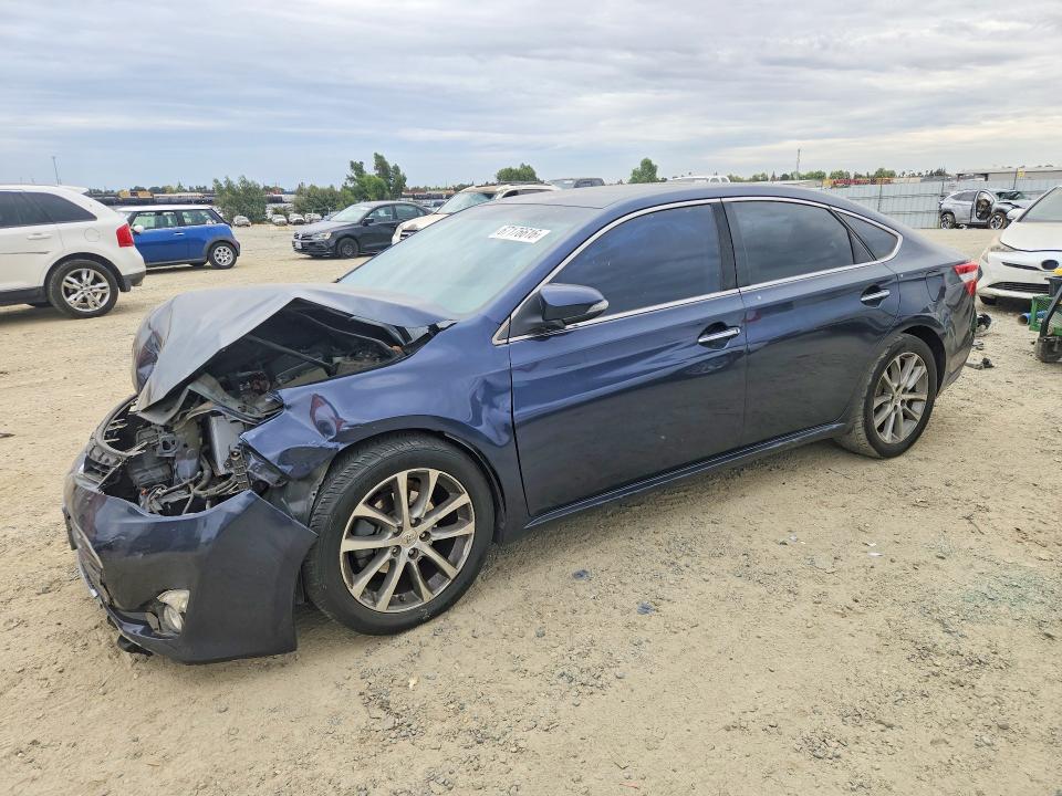 TOYOTA AVALON 2014 with VIN 4T1BK1EB8EU102399 - Photo from auction