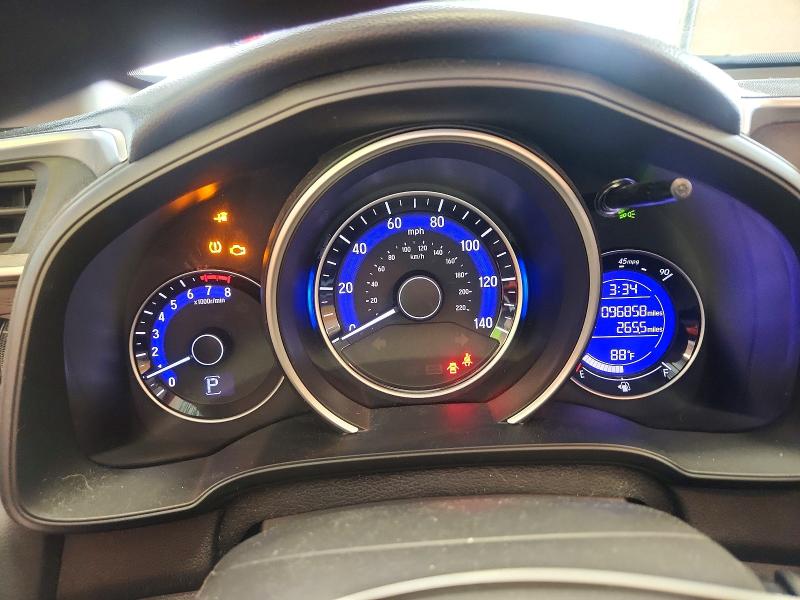 Снимка 9 от търг – 2015 HONDA FIT с VIN 3HGGK5H84FM720439