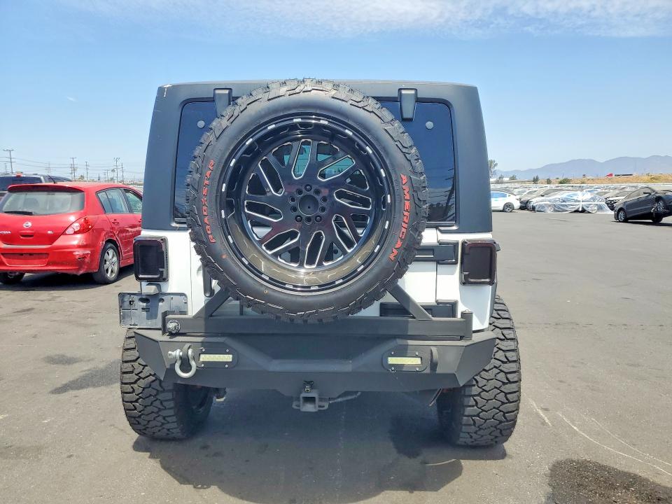 Photo 6 from auction – 2014 JEEP WRANGLER with VIN 1C4BJWCG9EL102551