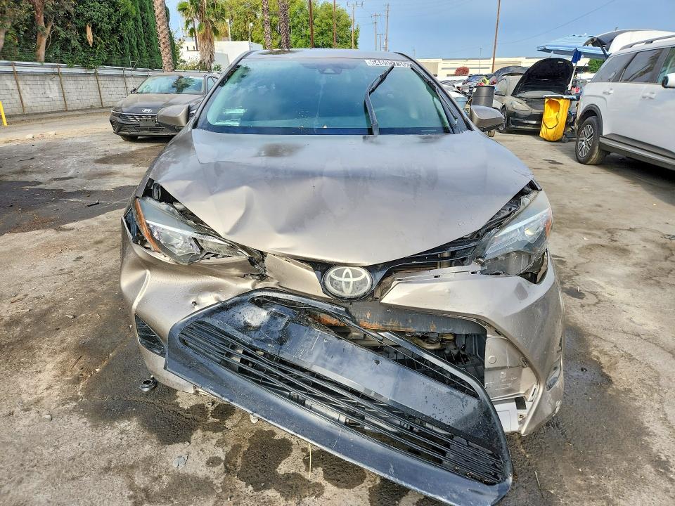 Фото 5 с аукциона – 2017 TOYOTA COROLLA с VIN 5YFBURHE7HP667280