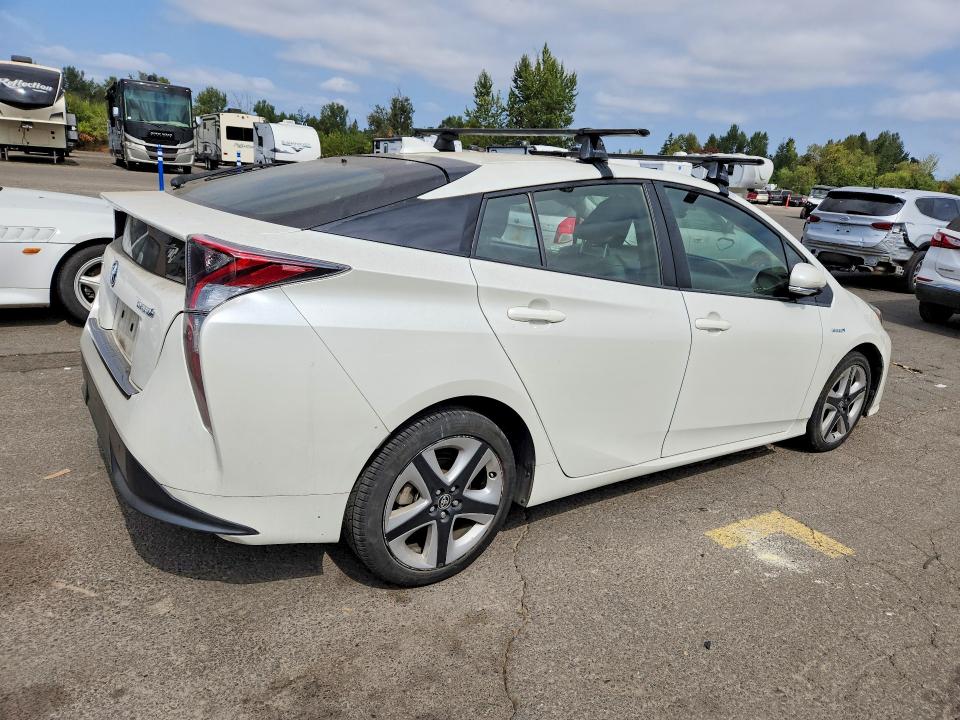 Photo 3 from auction – 2016 TOYOTA PRIUS with VIN JTDKARFU1G3515621