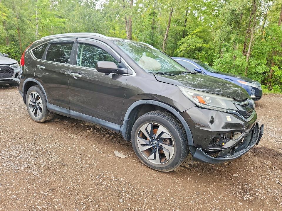 Photo 4 from auction – 2016 HONDA CR-V with VIN 5J6RM4H92GL806561