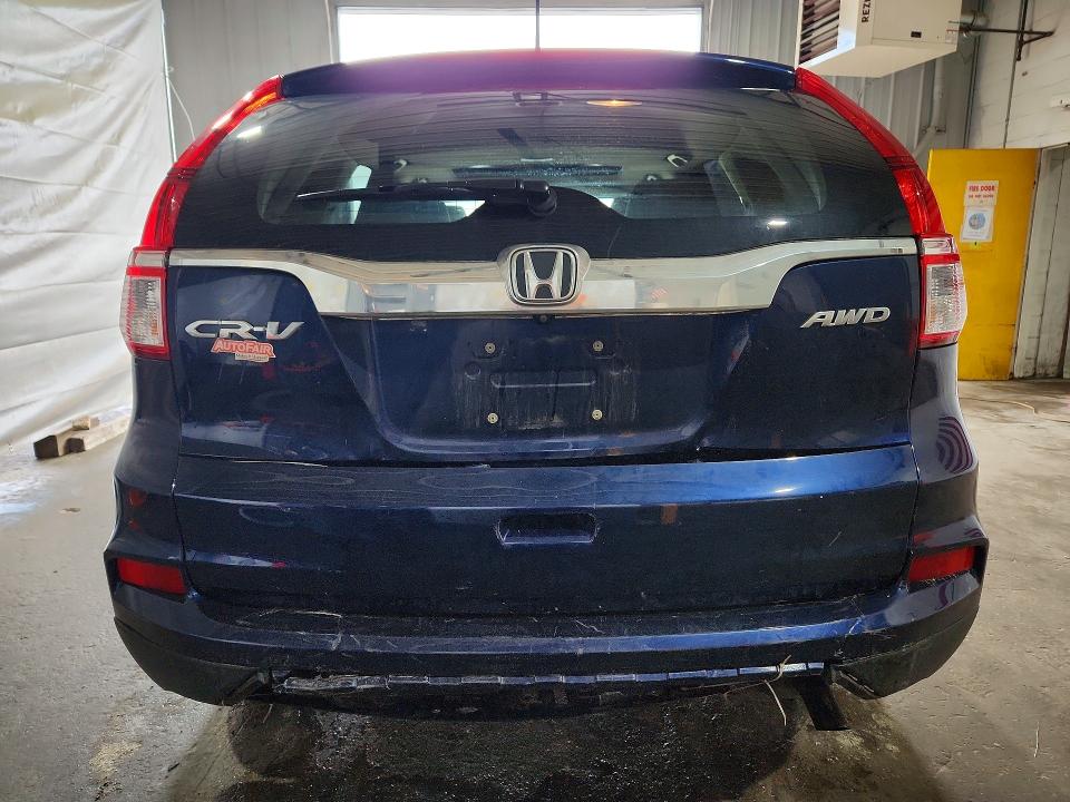 Photo 6 from auction – 2016 HONDA CR-V with VIN 2HKRM4H52GH628142