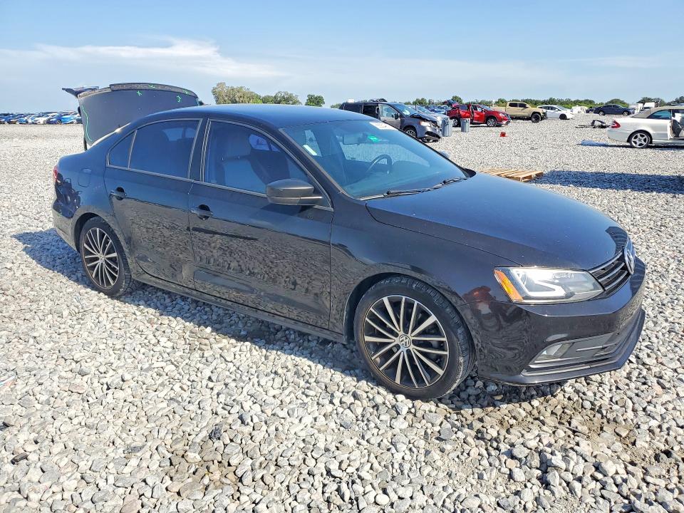 Photo 4 from auction – 2015 VOLKSWAGEN JETTA with VIN 3VWD17AJ5FM404574