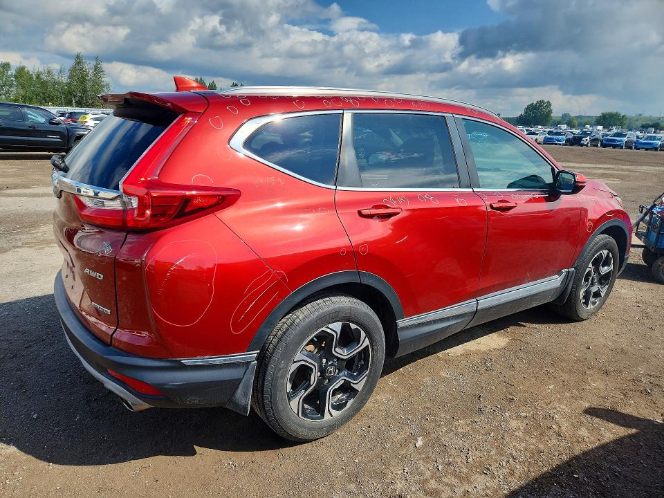 Photo 3 from auction – 2019 HONDA CR-V with VIN 2HKRW2H98KH137696