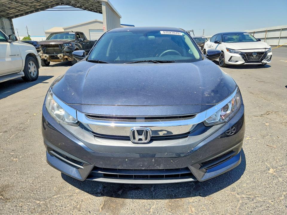 Снимка 5 от търг – 2018 HONDA CIVIC с VIN 2HGFC2F58JH609660