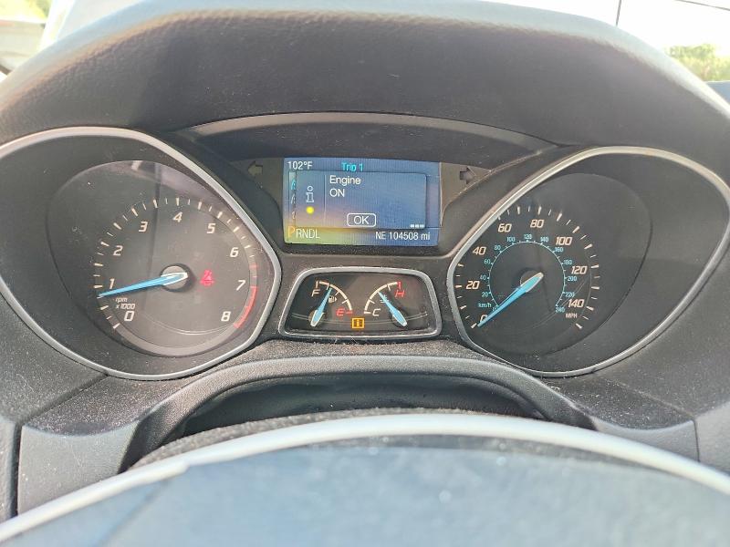Photo 9 from auction – 2014 FORD FOCUS with VIN 1FADP3E22EL426955