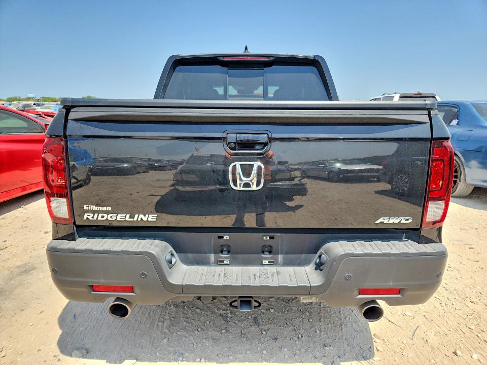 Photo 6 from auction – 2023 HONDA RIDGELINE with VIN 5FPYK3F82PB016280