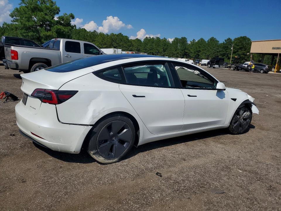 Photo 3 from auction – 2022 TESLA MODEL 3 with VIN 5YJ3E1EB9NF335636