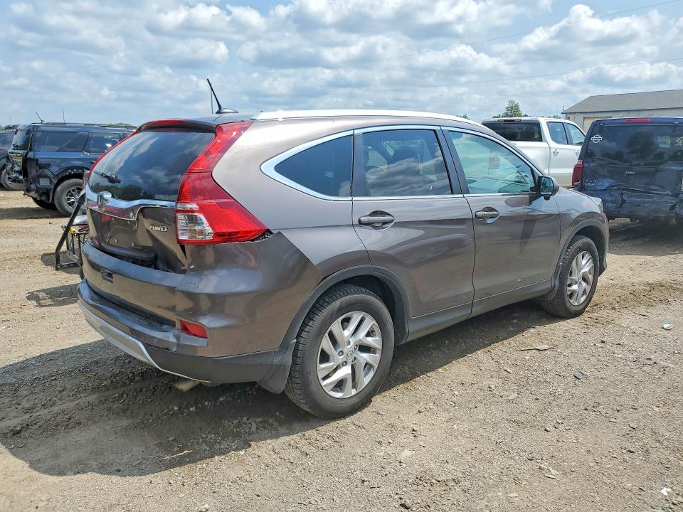 Photo 3 from auction – 2016 HONDA CR-V with VIN 2HKRM4H71GH695851