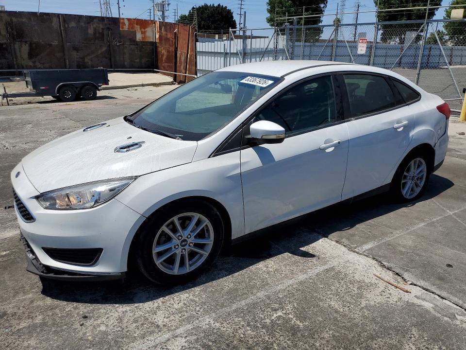 FORD FOCUS 2016 with VIN 1FADP3F2XGL399201 - Photo from auction