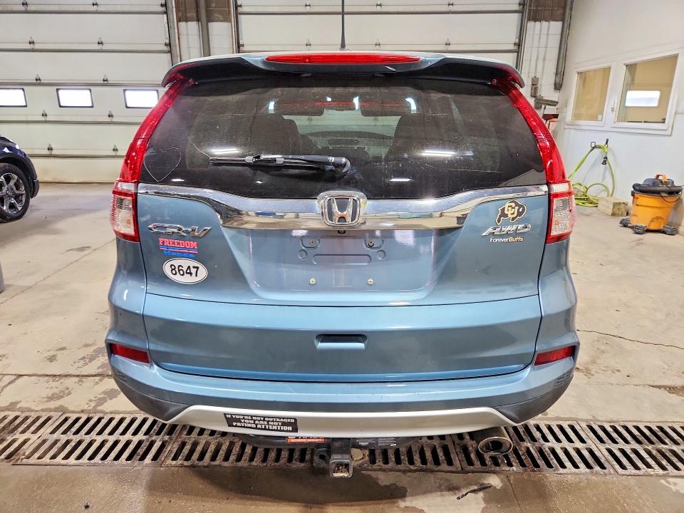 Photo 6 from auction – 2016 HONDA CR-V with VIN 2HKRM4H77GH694705