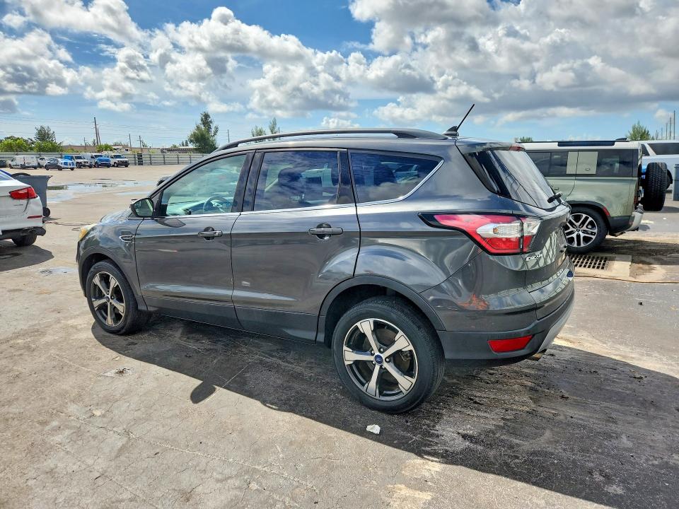 Photo 2 from auction – 2018 FORD ESCAPE with VIN 1FMCU0HD2JUA20541