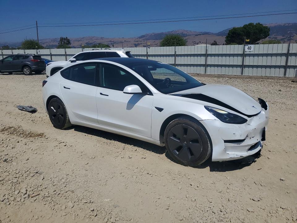 Photo 4 from auction – 2021 TESLA MODEL 3 with VIN 5YJ3E1EA9MF998050