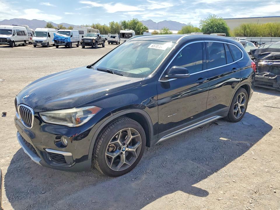 BMW X1 2016 with VIN WBXHT3C34GP888564 - Photo from auction