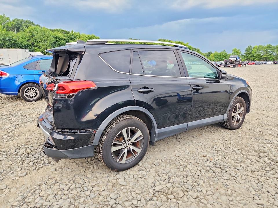 Photo 3 from auction – 2016 TOYOTA RAV4 with VIN 2T3RFREV6GW429700
