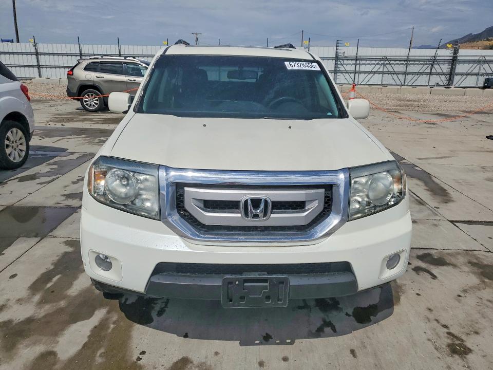 Photo 5 from auction – 2011 HONDA PILOT with VIN 5FNYF4H91BB066475
