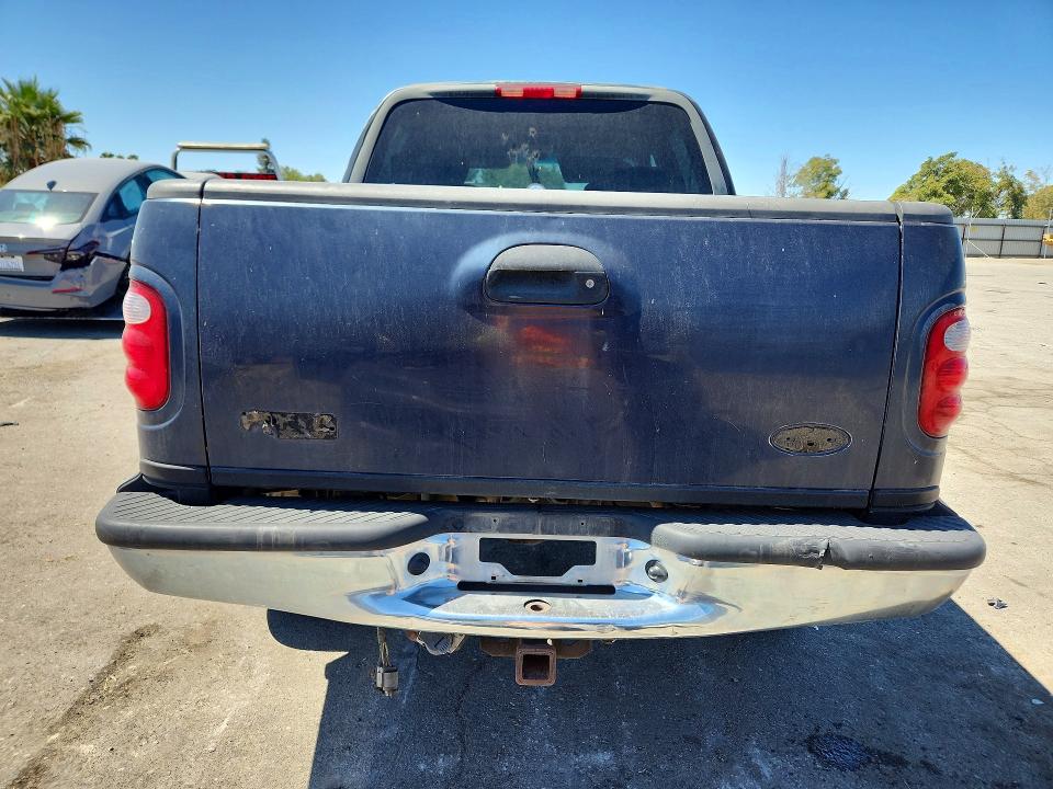 Photo 6 from auction – 2001 FORD F150 with VIN 1FTRW08L31KC53128