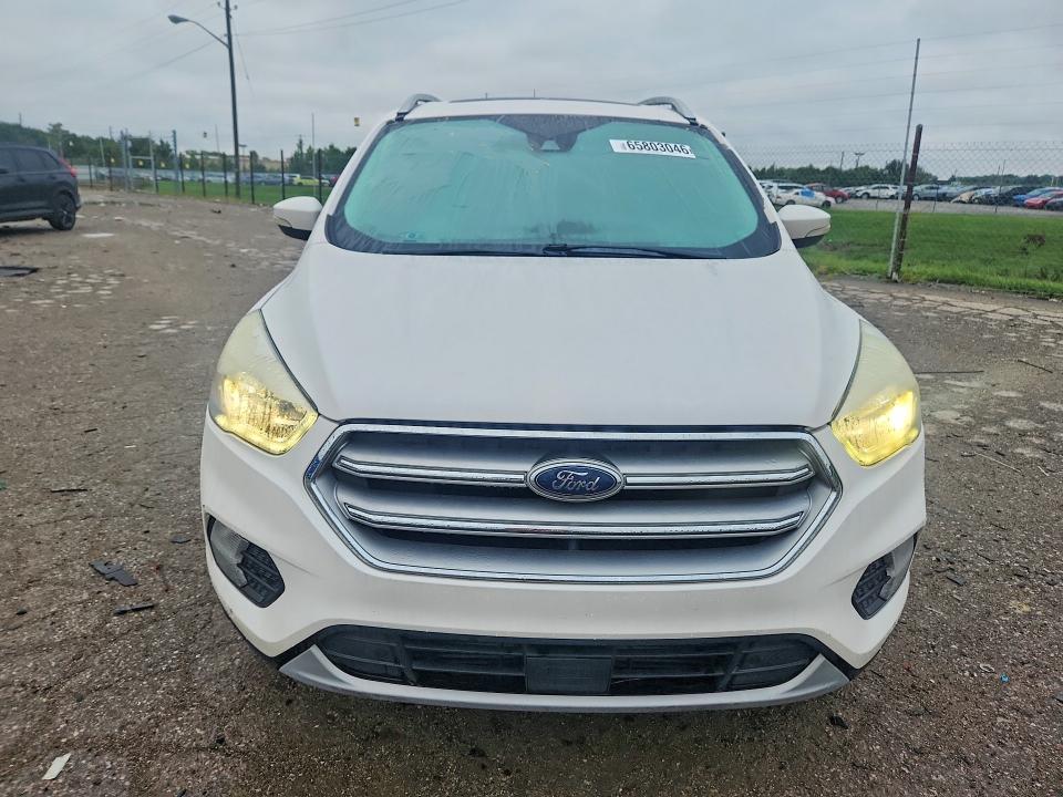 Photo 5 from auction – 2017 FORD ESCAPE with VIN 1FMCU0J97HUE84571
