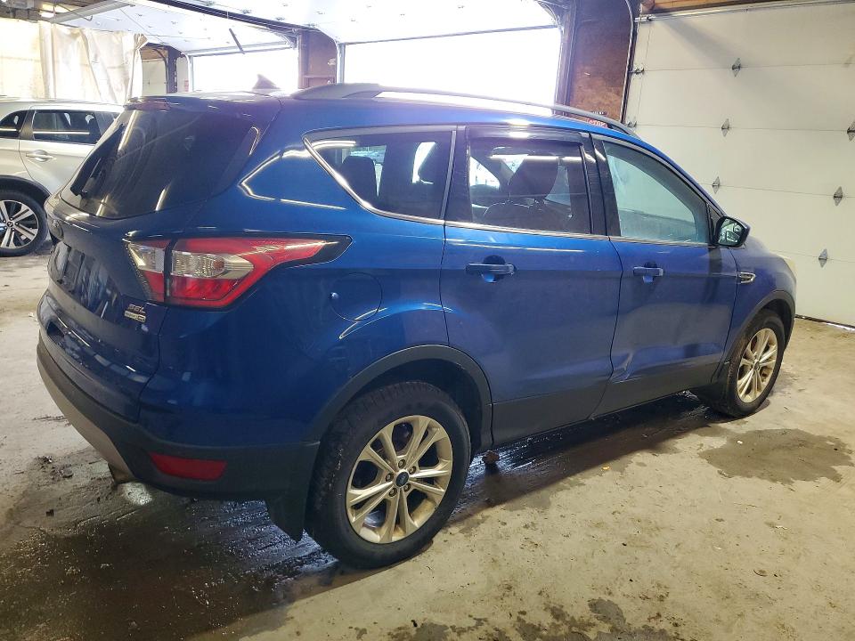 Photo 3 from auction – 2018 FORD ESCAPE with VIN 1FMCU9HD9JUB39143