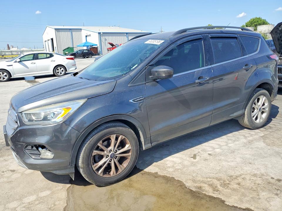 FORD ESCAPE 2017 with VIN 1FMCU0GD9HUD93409 - Photo from auction