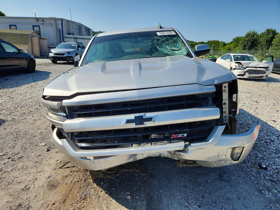 Photo 5 from auction – 2018 CHEVROLET SILVERADO with VIN 3GCUKREC8JG577861