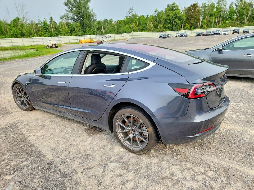 Photo 2 from auction – 2018 TESLA MODEL 3 with VIN 5YJ3E1EA2JF019075