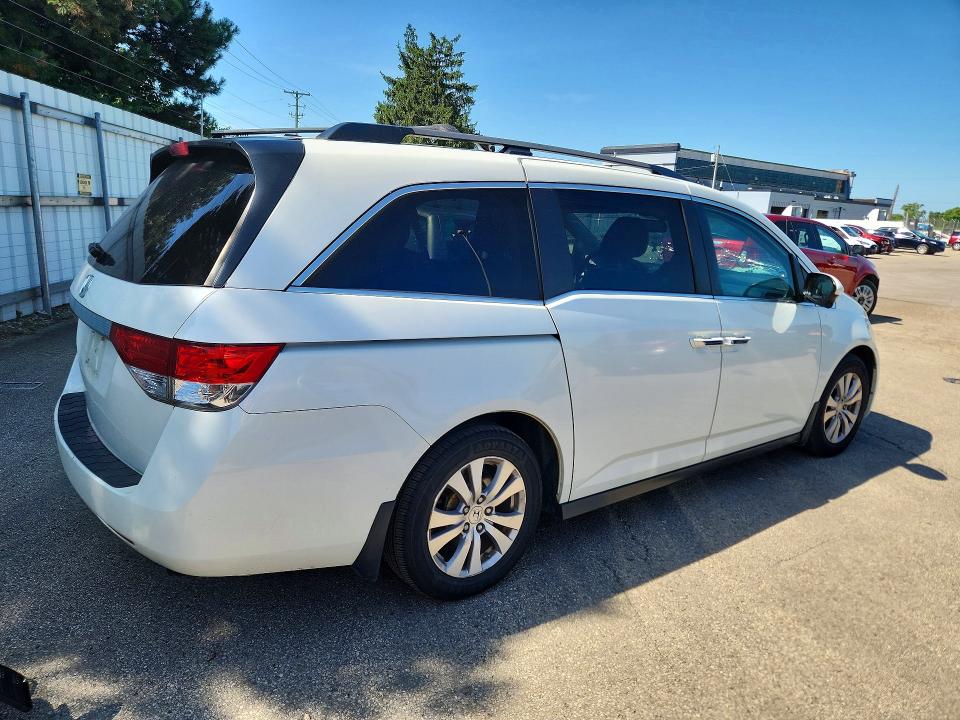 Photo 3 from auction – 2016 HONDA ODYSSEY with VIN 5FNRL5H61GB074060