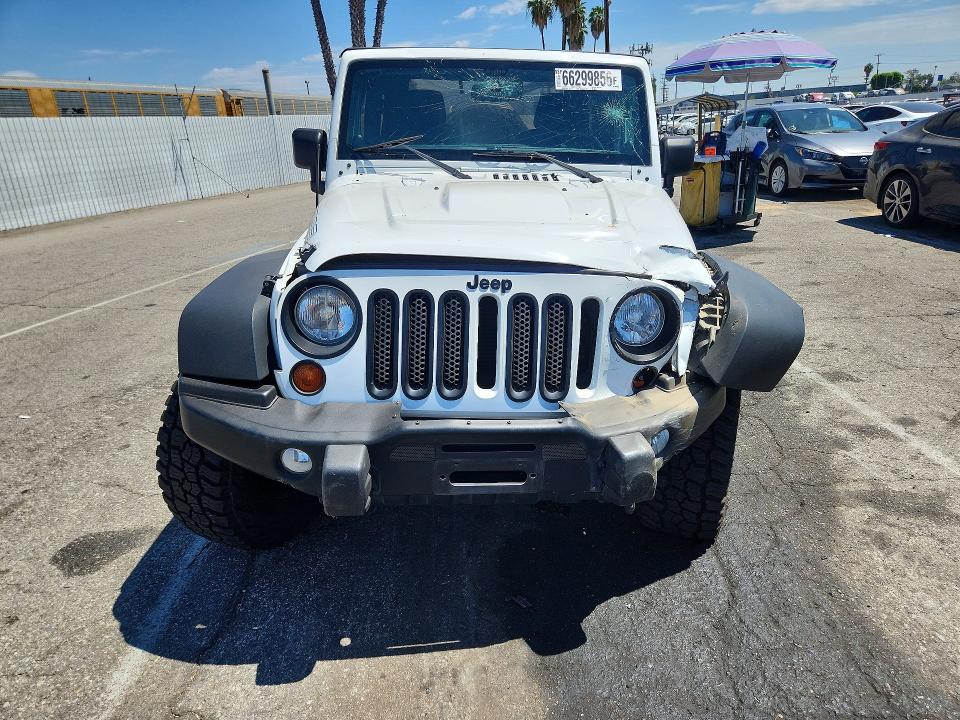 Photo 5 from auction – 2013 JEEP WRANGLER with VIN 1C4AJWBG9DL602415