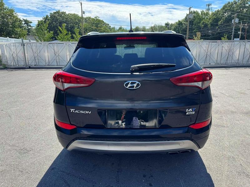 Photo 5 from auction – 2017 HYUNDAI TUCSON with VIN KM8J3CA2XHU281995