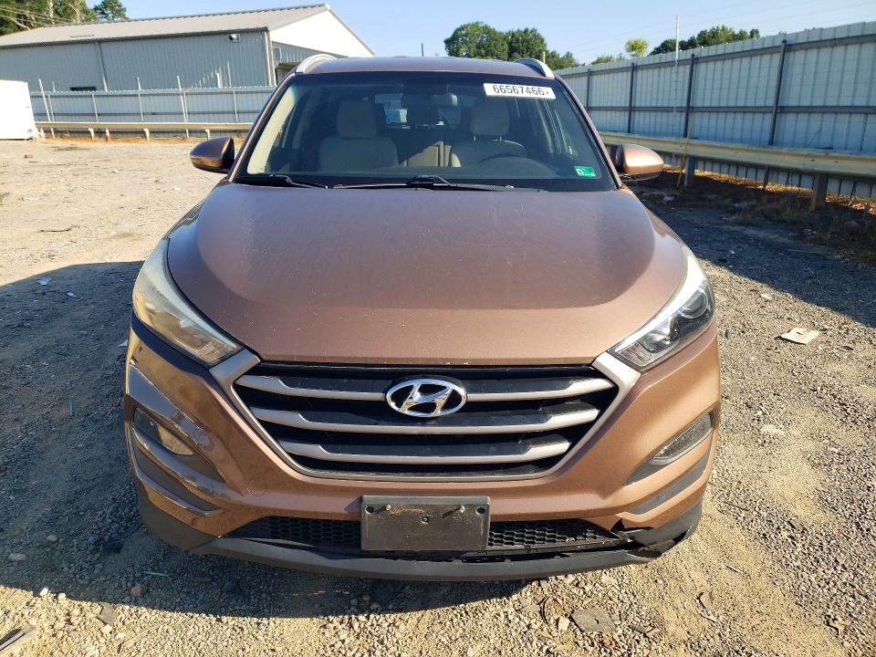 Photo 5 from auction – 2016 HYUNDAI TUCSON with VIN KM8J33A4XGU199751