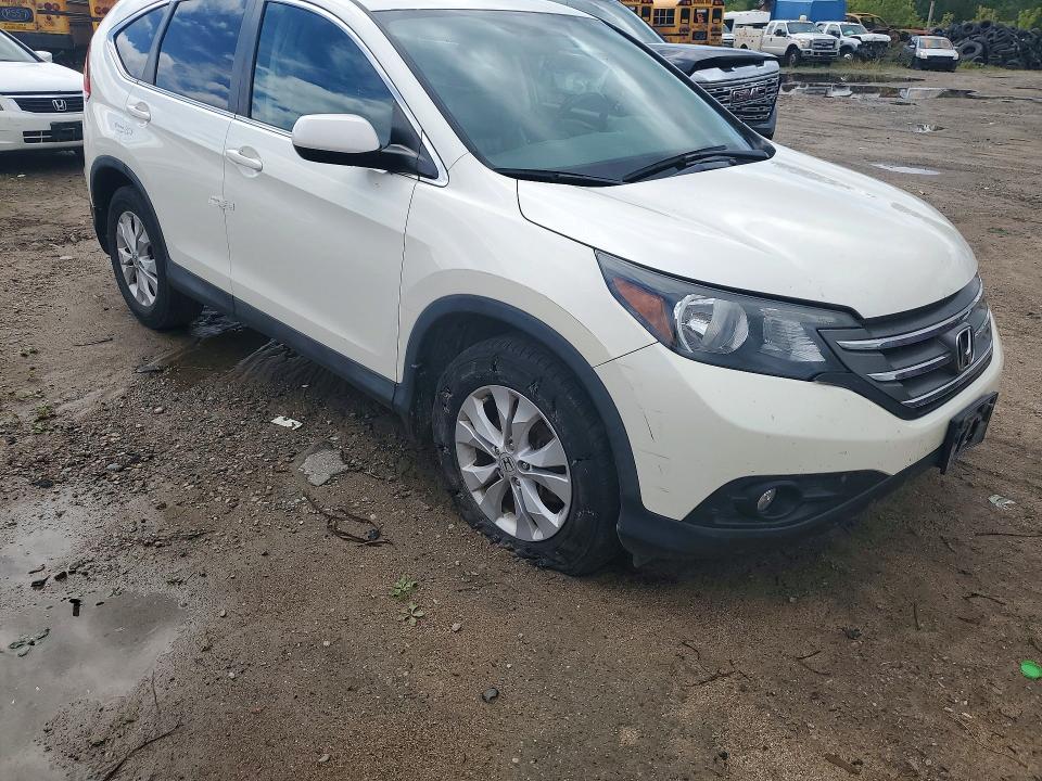 Photo 4 from auction – 2014 HONDA CR-V with VIN 2HKRM4H73EH102679