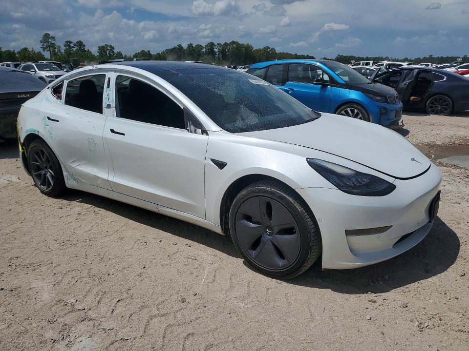 Photo 4 from auction – 2021 TESLA MODEL 3 with VIN 5YJ3E1EAXMF854989