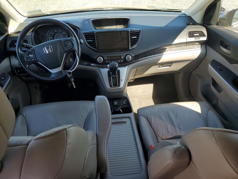 Photo 8 from auction – 2014 HONDA CR-V with VIN 2HKRM4H70EH608115